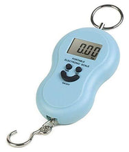 Mini digital weighing scale with LCD display.
